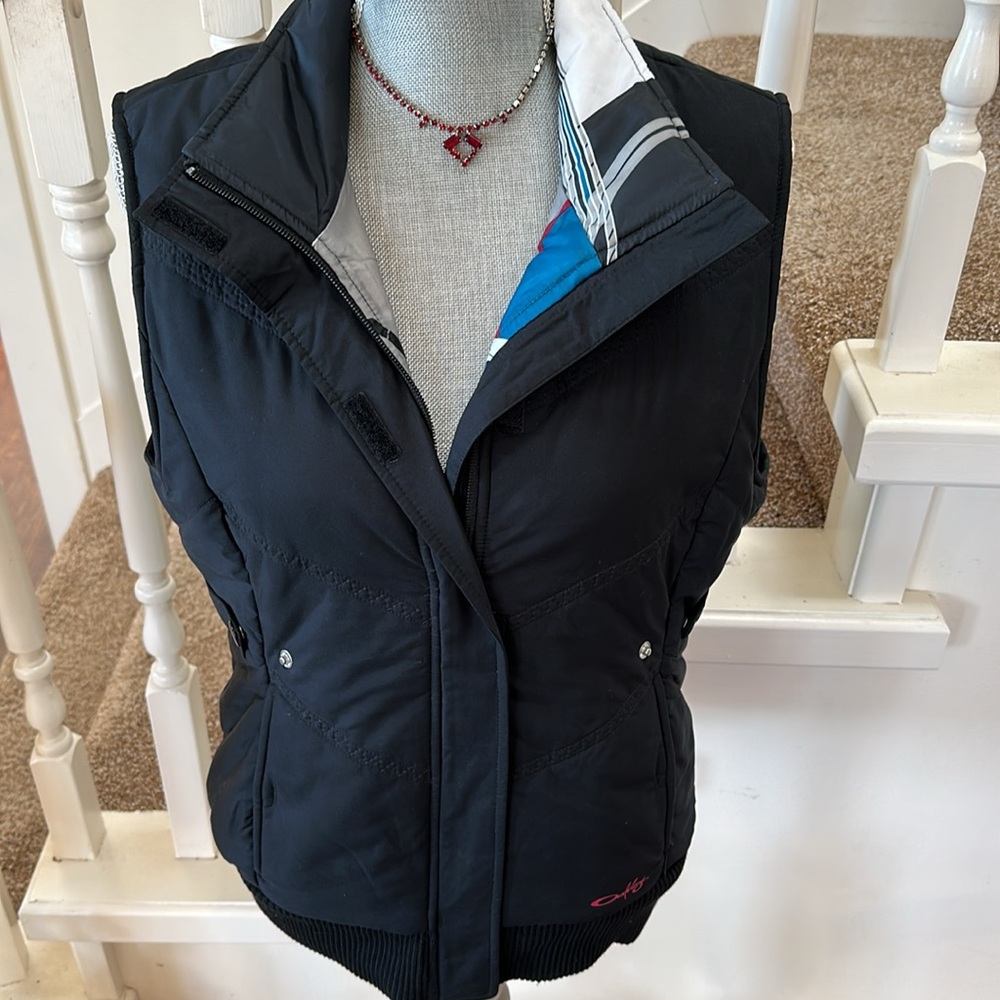 As new. Oakley vest